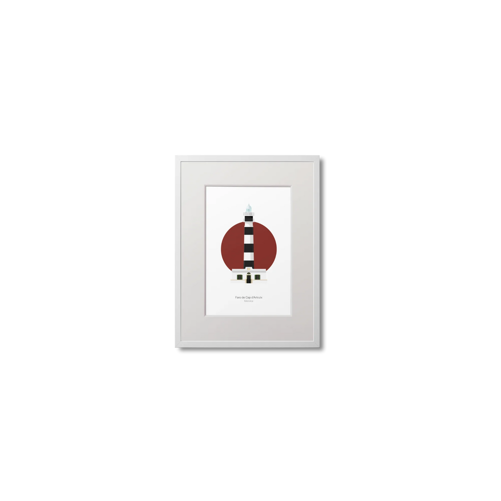 Framed artwork of a black and white striped lighthouse on a red circle and white background