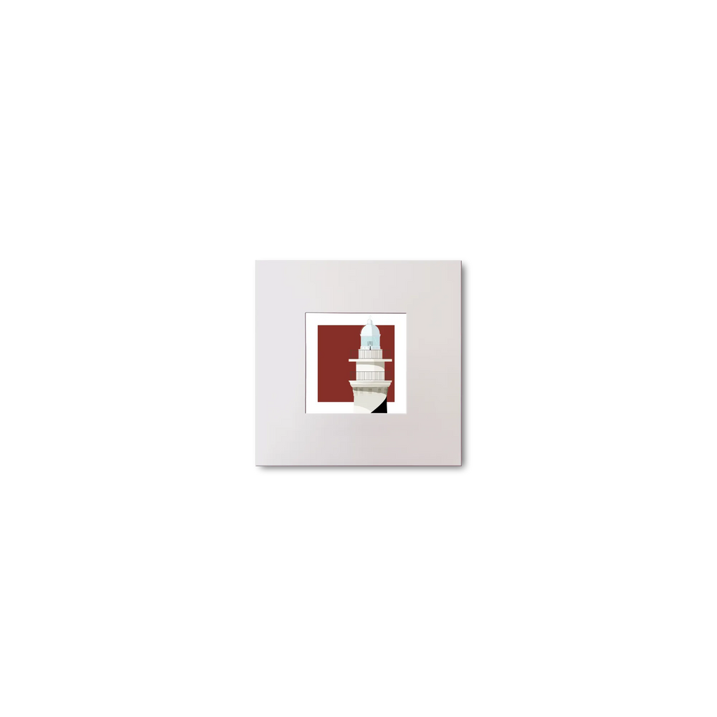 Small mounted  artwork of a white lighthosue with barber pole stripe on a red background