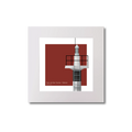Framed artwork of a black and white striped lighthouse on a red background