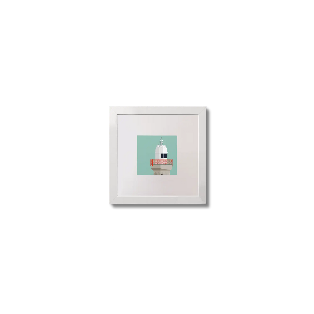 Framed artwork of a lighthouse with a red railing on an ocean green background