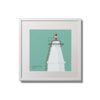 Contemporary wall hanging Copper Point lighthouse on an ocean green background,  in a white square frame measuring 20x20cm.