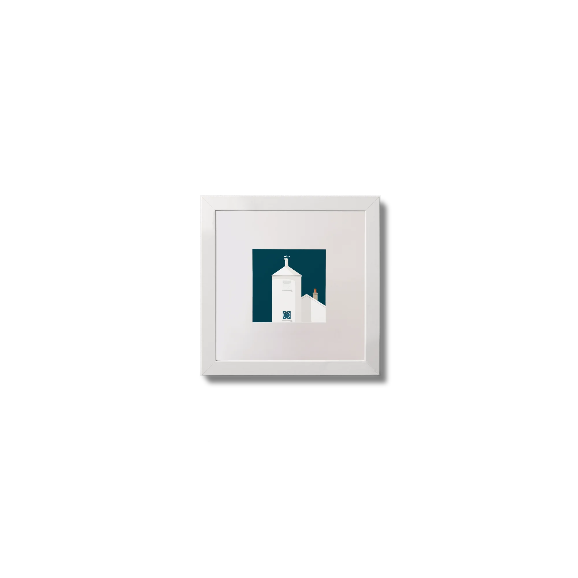 Small framed artwork of a white lighthouse with small building next to it on a midnight blue background