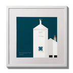 Framed artwork of a white lighthouse with small building next to it on a midnight blue background