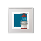 Square framed art print of a red and white lighthouse on a blue square background, measuring 20x20cm