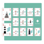 Playing cards with lighthouse designs on a teal background in the Munster suit.