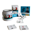 Lighthouse-themed mug and memory game set on a white background
