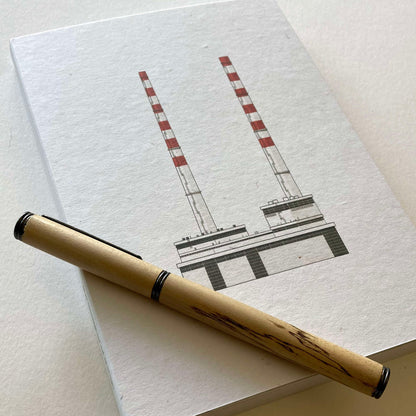 A5 sized notebook with Poolbeg Chimneys Dublin printed on the cover.